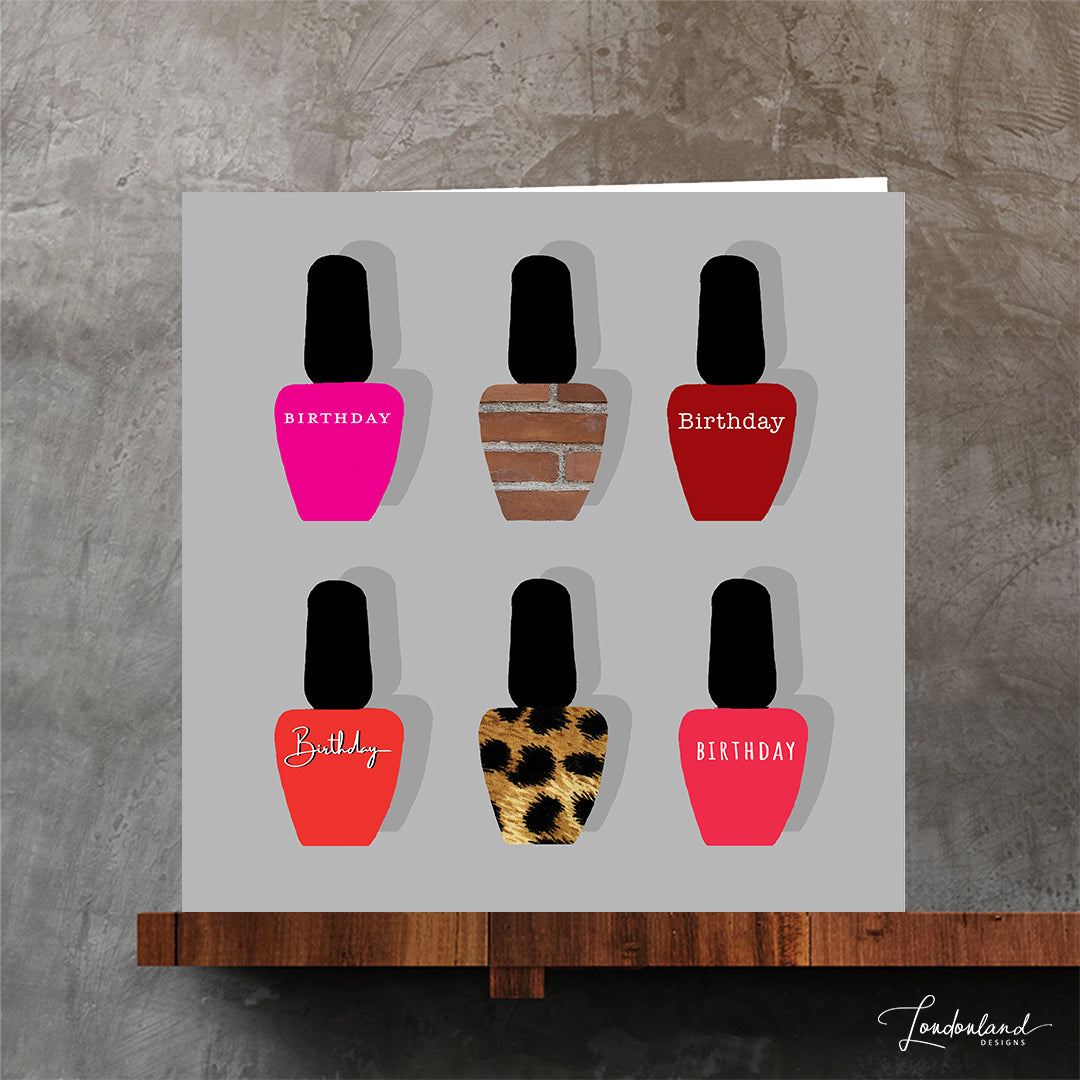 Nail varnish bottle designer birthday card on pale grey background