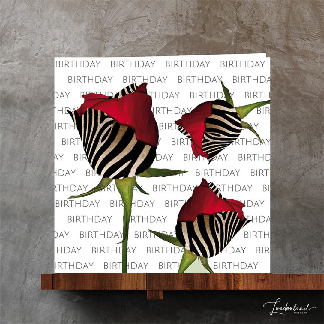 Original birthday card of zebra animal print and red rose petals. The roses were from my favourite local florist. Unique artwork by Londonland Designs.