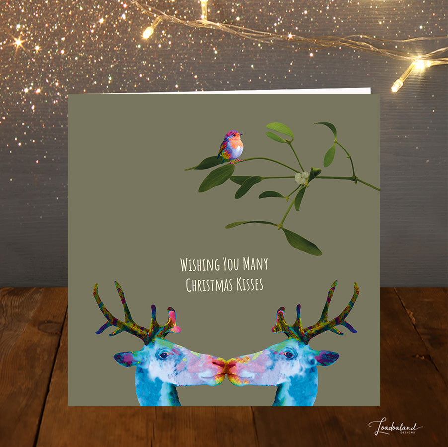 Christmas Wishes & Kisses. Christmas Card of kissing reindeers