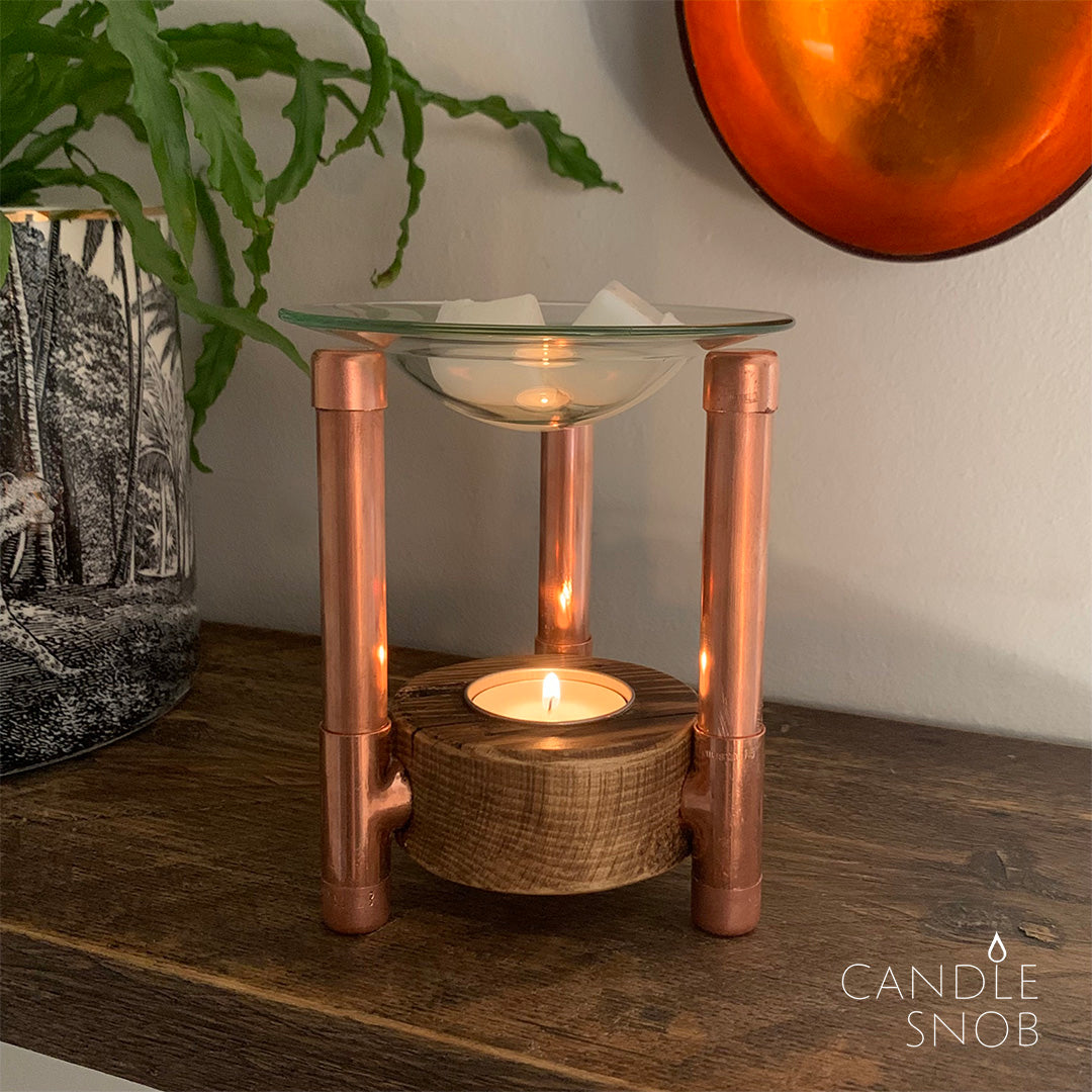 Candle Snob Wax melts in copper and wood wax burner.