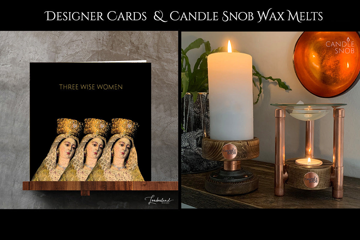 Londonland Designer Christmas card and candle snob wax melts with a candle and warmer on a table.
