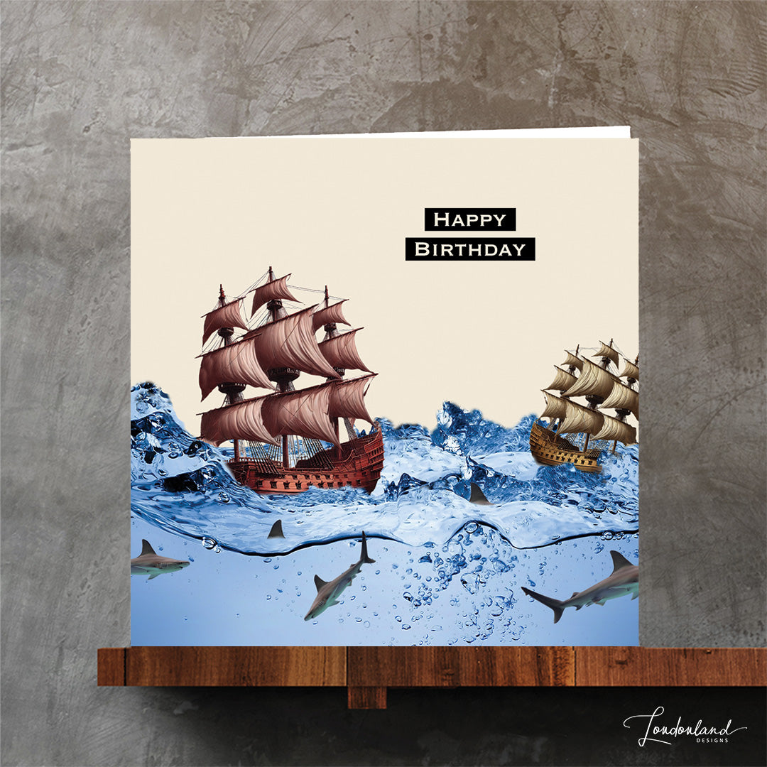 Birthday card with old ships and sharks on a beige background