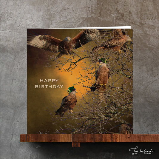 Kite birds wearing hats on tree branches, designer birthday card by Londonland Designs