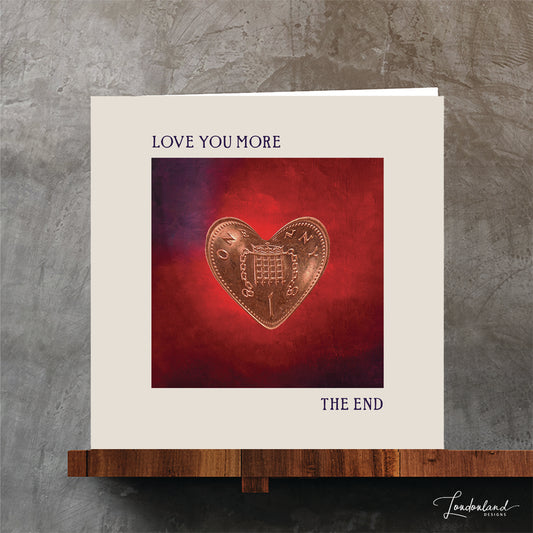 Heart shaped coin on rich red background anniversary card.  Love you more, the end by Londonland Designs