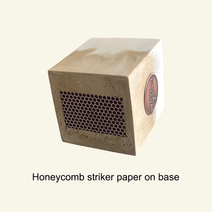 Match pot with honeycomb striker paper
