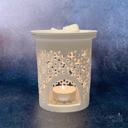 Candle Snob scented wax melts in white ceramic melter