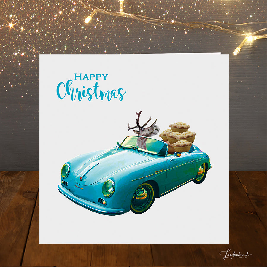 Mince Pie Delivery Christmas Card with blue sports car carrying mince pies