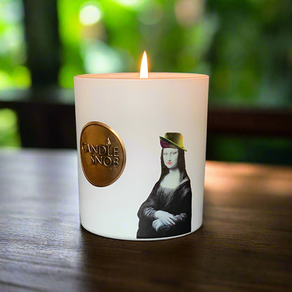 candle with Mona Lisa wearing a hat with red fingernails