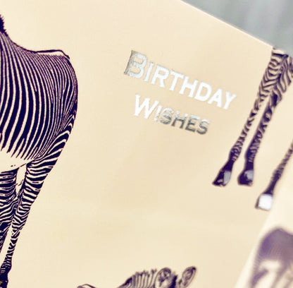 silver foil effect text on zebra greeting card